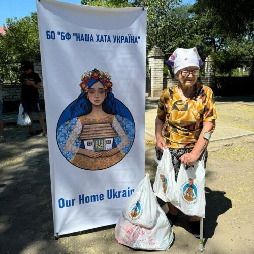 older women with grocery bags