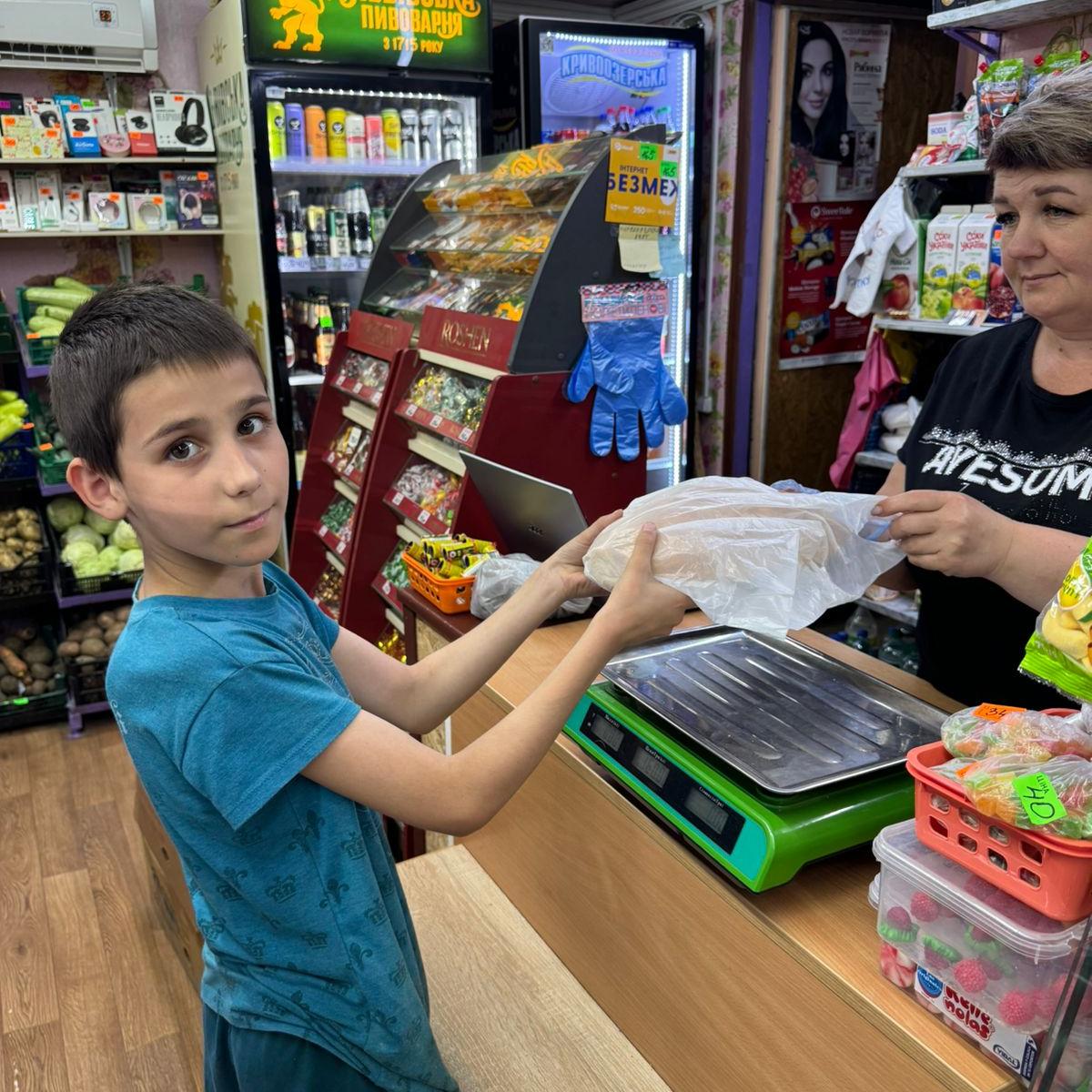 Boy getting bread